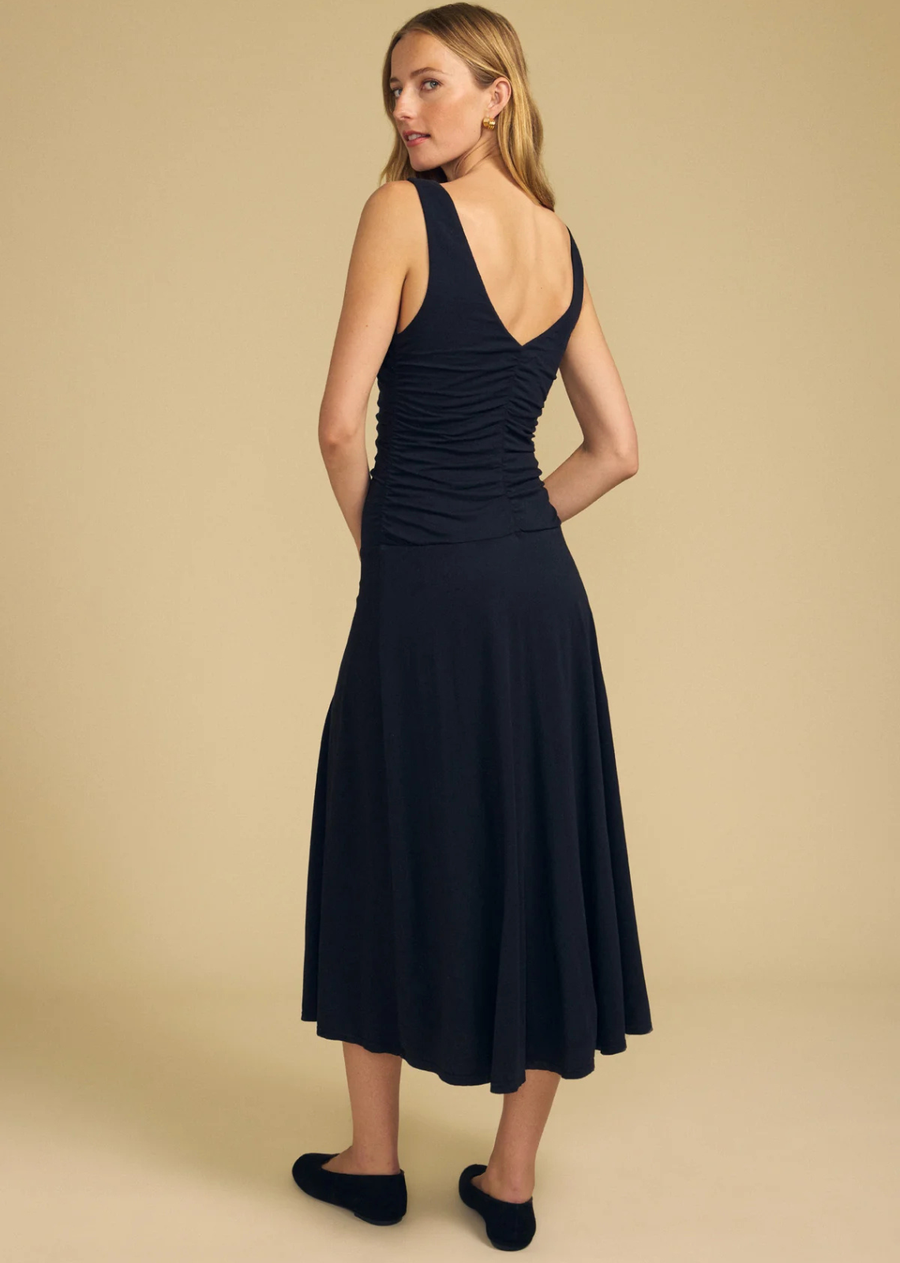 Light and airy in our signature gauzy whisper, this lined midi dress features a round neckline with a subtle V at the back for a touch of elegance. Shirring through the bodice and along the back seam adds soft texture and shape.