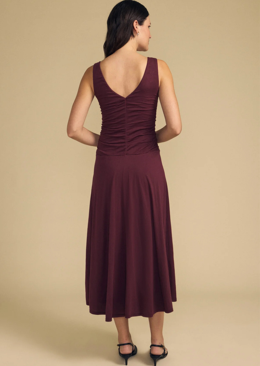 Light and airy in our signature gauzy whisper, this lined midi dress features a round neckline with a subtle V at the back for a touch of elegance. Shirring through the bodice and along the back seam adds soft texture and shape.