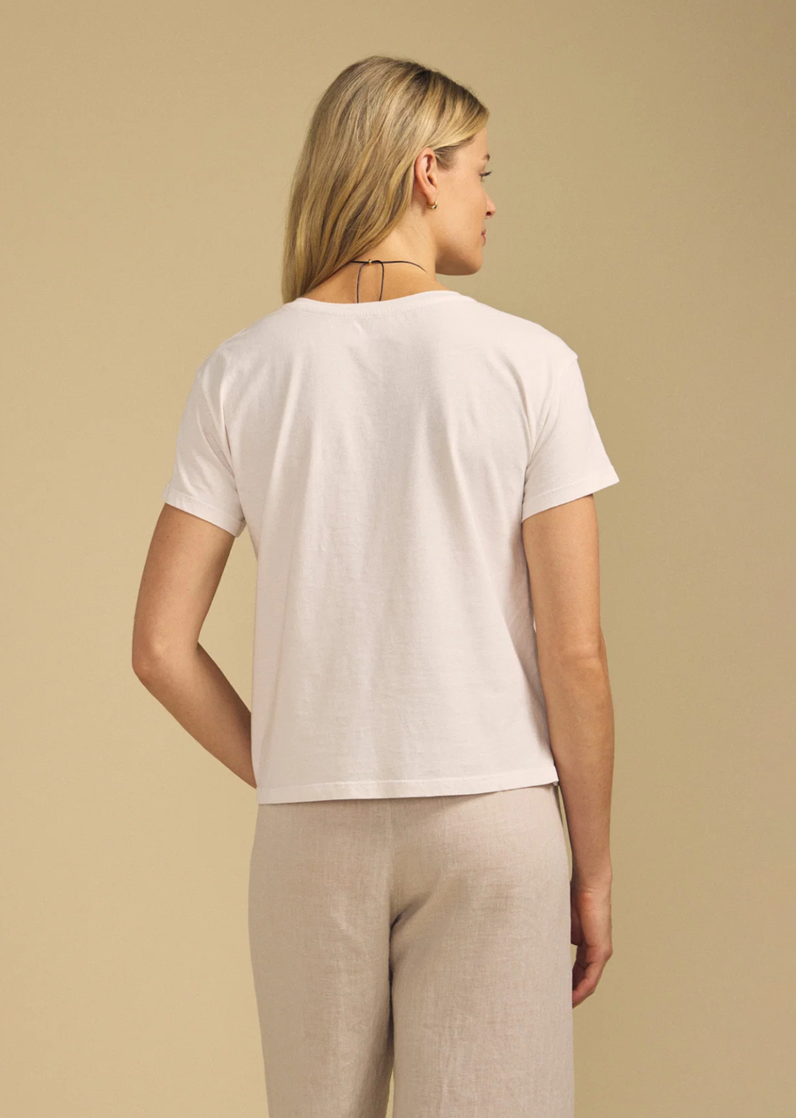 A classic crewneck tee crafted from soft, breathable cotton jersey for an easy, lived-in feel. It's the kind of timeless essential that works perfectly on its own or layered under your favorite jacket or knit.