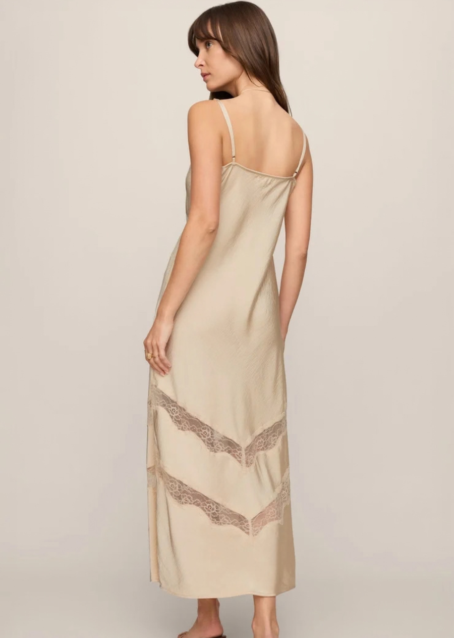 Crafted from lightweight luxe satin, this unlined midi dress features sheer lace insets and adjustable straps that keep the fit feeling easy. The result is a dress that feels just as right for an impromptu dinner as it does for the plans circled on your calendar.