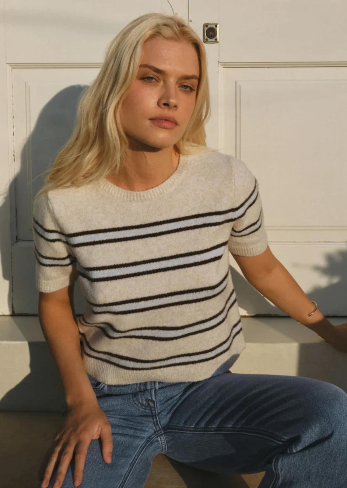 Soft cotton-blend yarns and a hint of stretch give this striped sweater tee its easy, wear-anywhere feel. Lightweight enough for transitional weather and comfortable enough for all-day wear, it’s the kind of knit that works just as well with relaxed denim as it does layered under jackets once the temperature finally drops.