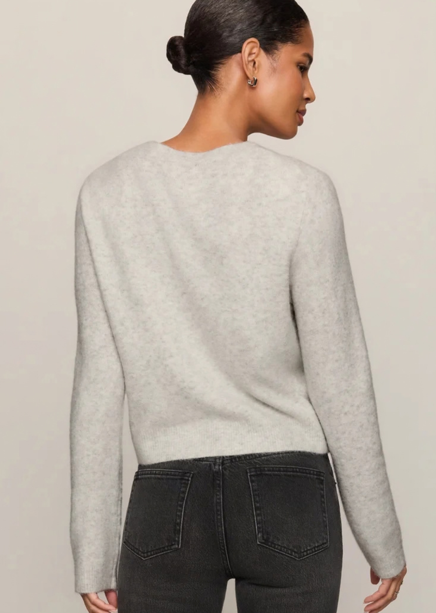 This relaxed crewneck cardigan is made from cozy sweater yarns with an easy button-up front that’s perfect for layering. Whether tossed over a tank or worn solo, it’s the ideal go-to for cozy, casual days.