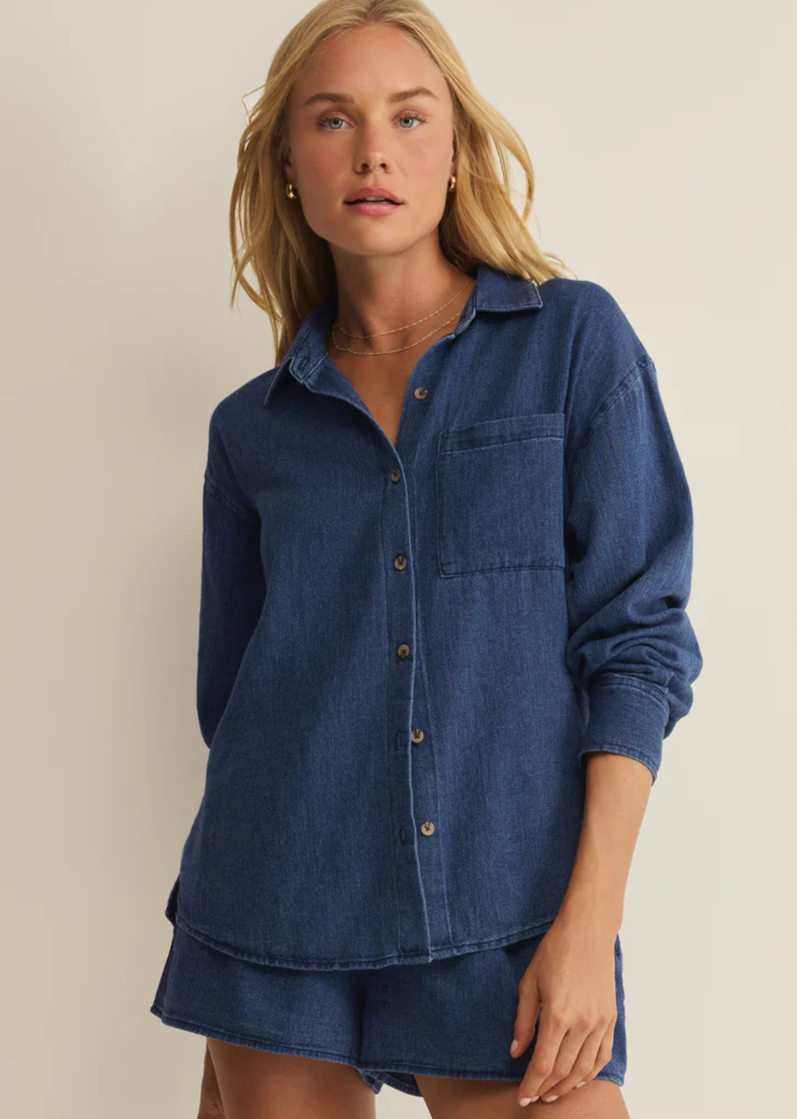 This twill button-up has that borrowed-from-someone-good taste kind of feel. Made from soft indigo cotton twill, it’s relaxed with a drape that makes it easy to wear tucked, layered, or tossed on open over a tank. The kind of piece that naturally becomes part of your everyday rotation.