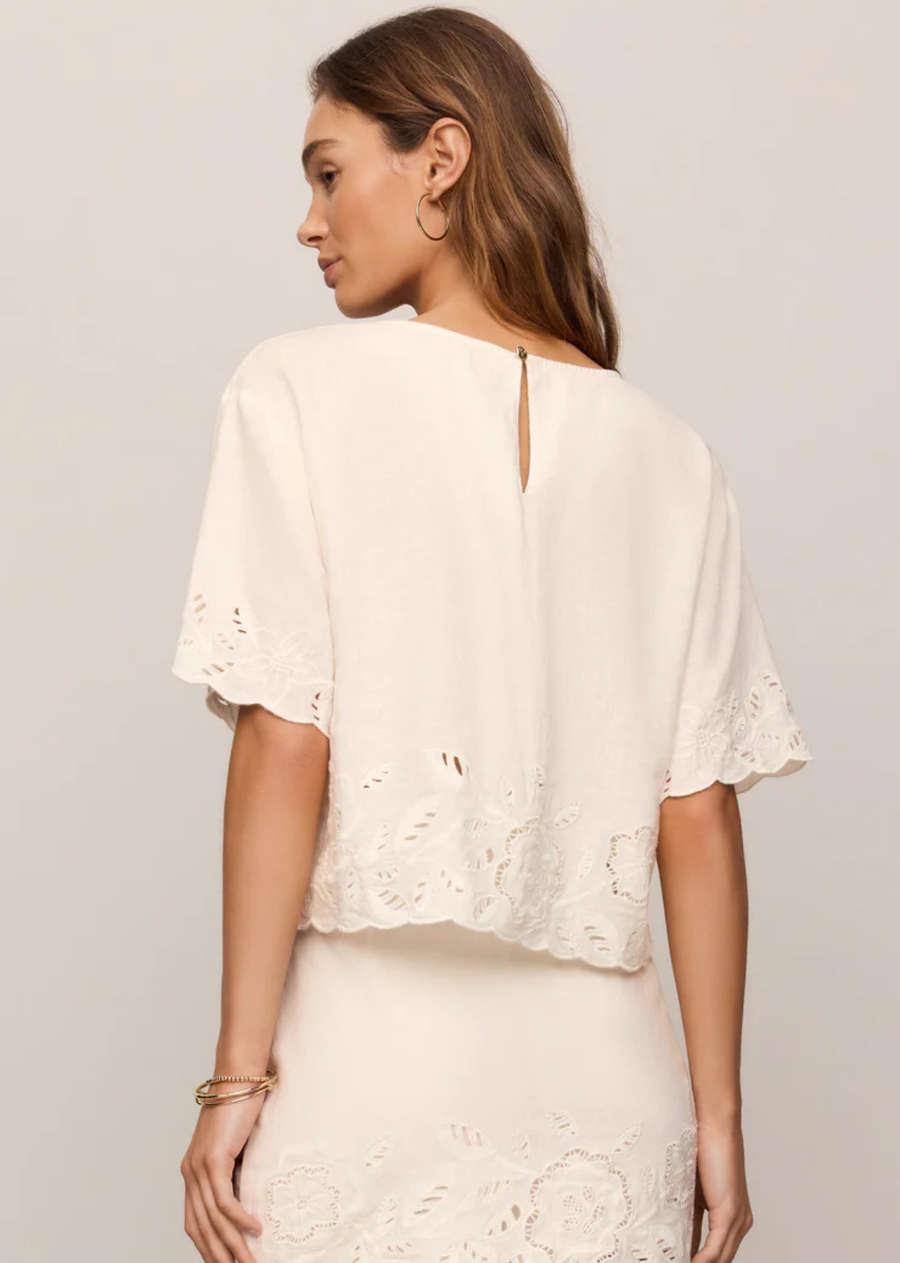 Grounded in Lindye Galloway’s love of texture and ease, this Z SUPPLY x Lindye Galloway collection washed linen blend top features floral cutwork embroidery and a back keyhole detail. The relaxed, boxy fit creates an airy silhouette that feels light, effortless, and thoughtfully finished.