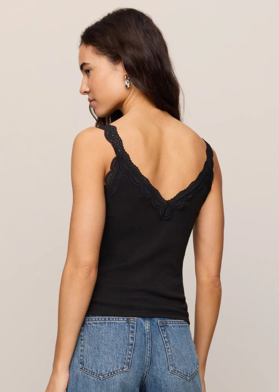 Made from soft Baby Rib cotton with a close, flattering fit, this tank brings a delicate touch to your everyday lineup. The lace-trimmed neckline adds a pretty, vintage-inspired feel, while the easy silhouette layers effortlessly or wears beautifully on its own.
