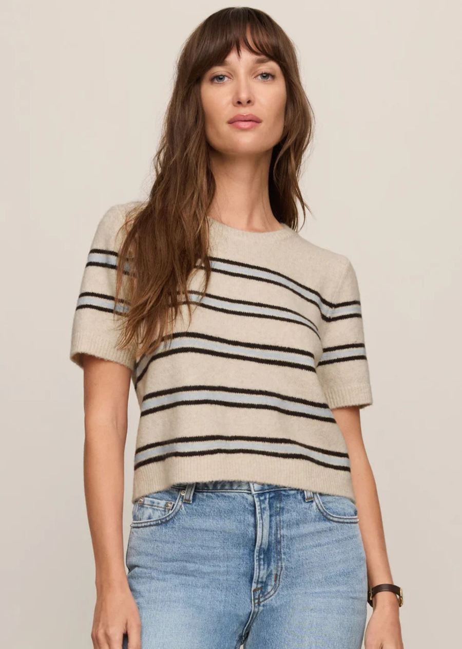Soft cotton-blend yarns and a hint of stretch give this striped sweater tee its easy, wear-anywhere feel. Lightweight enough for transitional weather and comfortable enough for all-day wear, it’s the kind of knit that works just as well with relaxed denim as it does layered under jackets once the temperature finally drops.