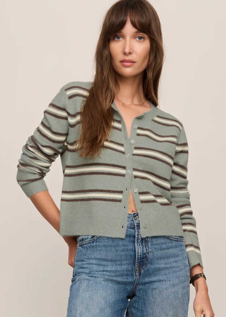 The Medina cardigan returns in a striped version that feels slightly nostalgic in the best possible way. Cozy stretch yarns keep it soft and comfortable, while the easy button-front silhouette makes it especially good layered over tanks, tees, and whatever denim you currently have on rotation.