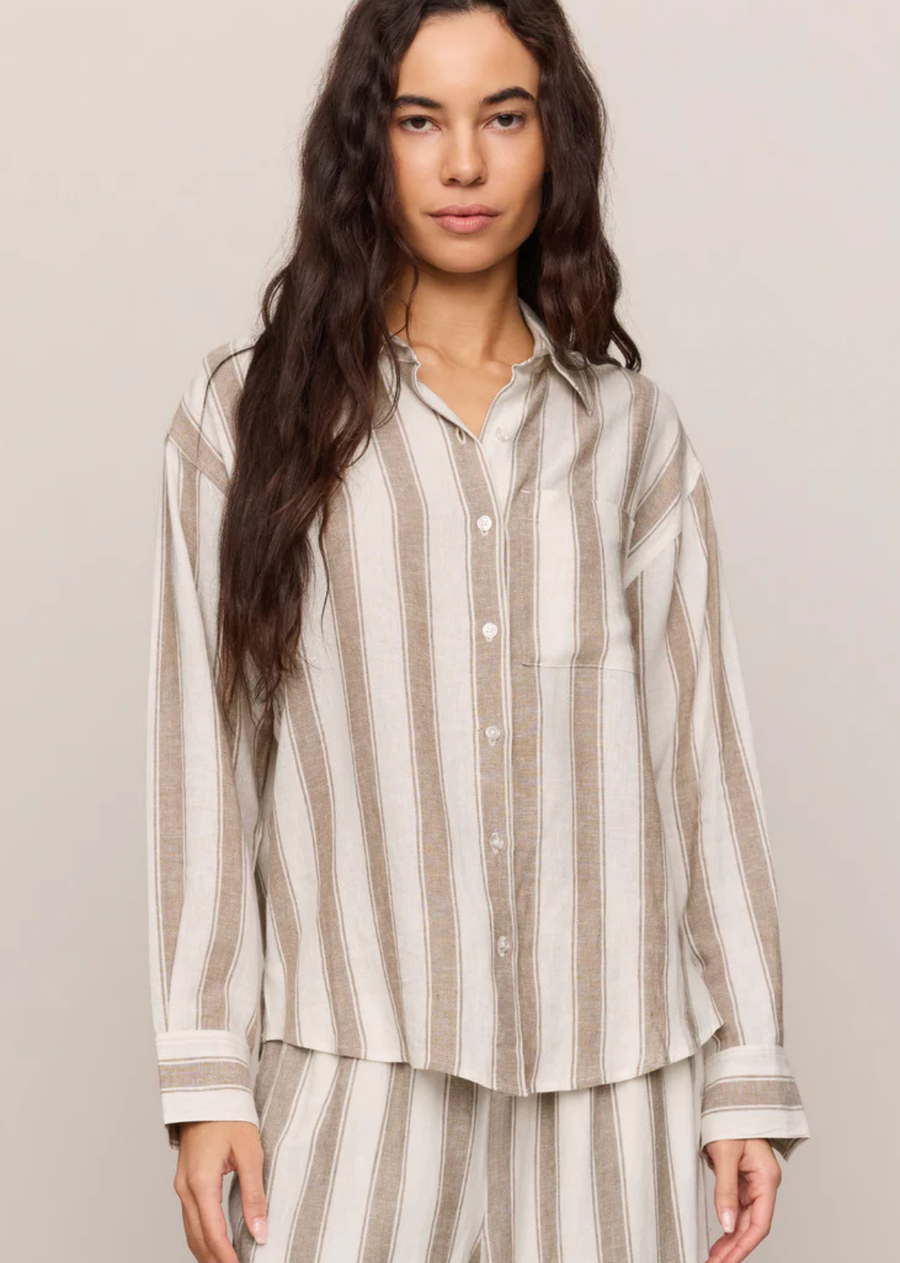 An easy button up with a lighter feel. Made from a lightweight linen blend with a soft, textured finish and natural drape, this striped style keeps things relaxed while still feeling put together. Airy and breathable, it’s the kind of piece you’ll toss on, layer with your go-to favorites, or pair with the matching pieces for a laid-back set.