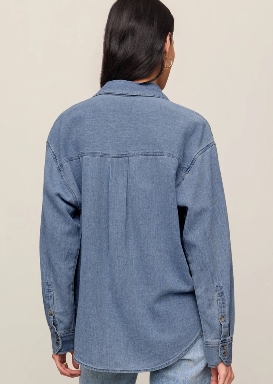 This twill button-up has that borrowed-from-someone-good taste kind of feel. Made from soft indigo cotton twill, it’s relaxed with a drape that makes it easy to wear tucked, layered, or tossed on open over a tank. The kind of piece that naturally becomes part of your everyday rotation.