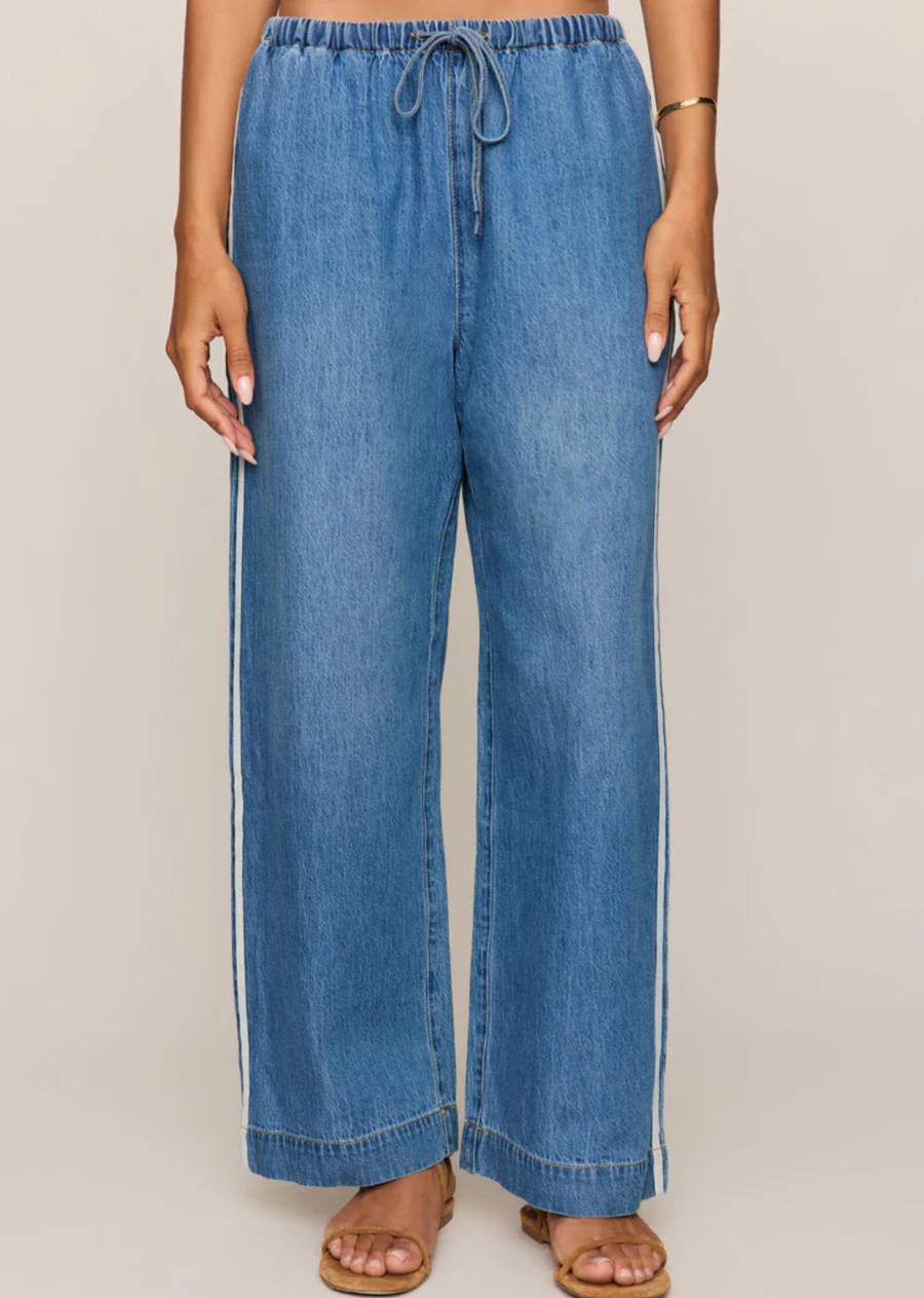 Sporty details and soft denim give these bestselling track pants an effortlessly cool feel.