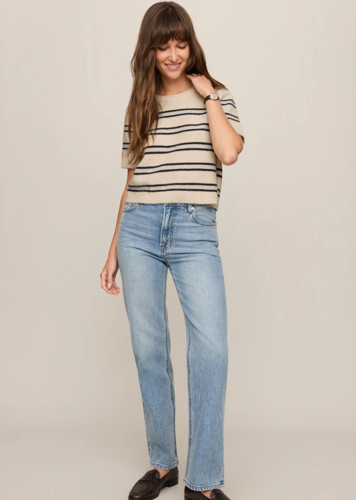 Soft cotton-blend yarns and a hint of stretch give this striped sweater tee its easy, wear-anywhere feel. Lightweight enough for transitional weather and comfortable enough for all-day wear, it’s the kind of knit that works just as well with relaxed denim as it does layered under jackets once the temperature finally drops.