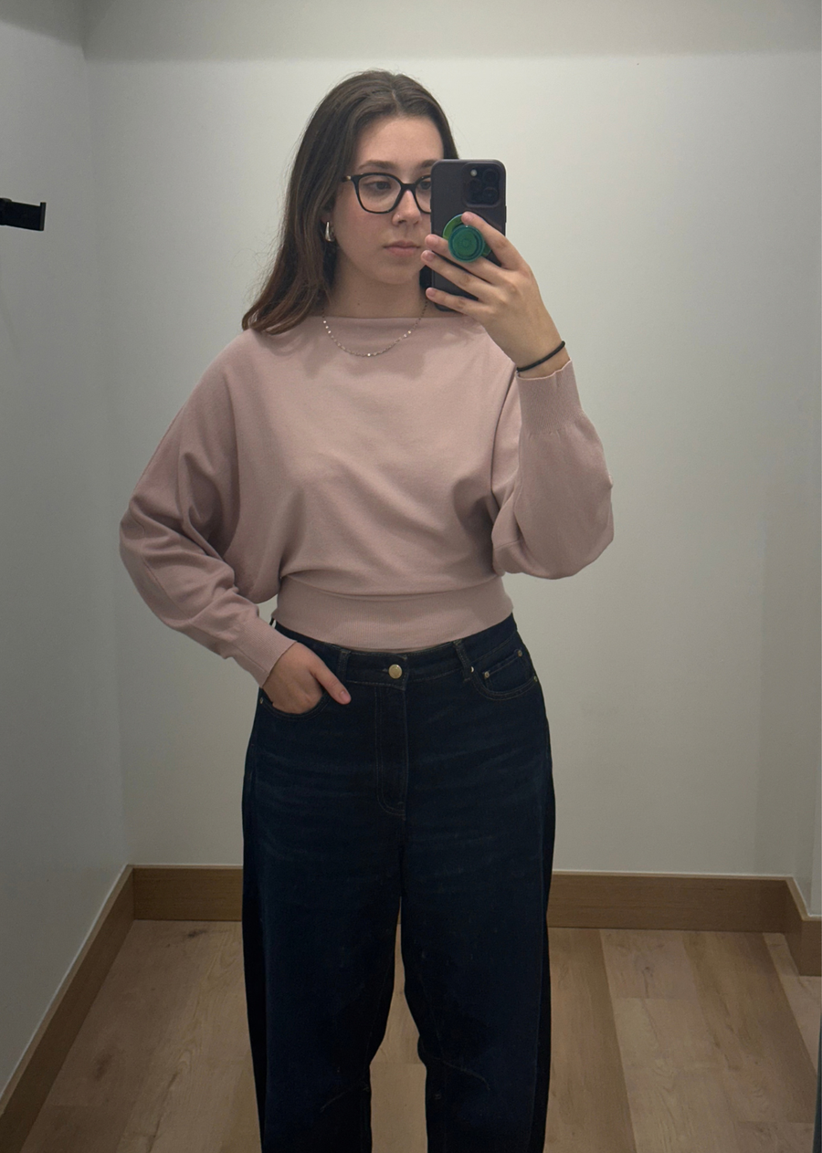 avalon cashmere blend dolman top in baby pink, featuring a relaxed dolman silhouette, soft knit fabric, long sleeves, and a fitted waistband. 