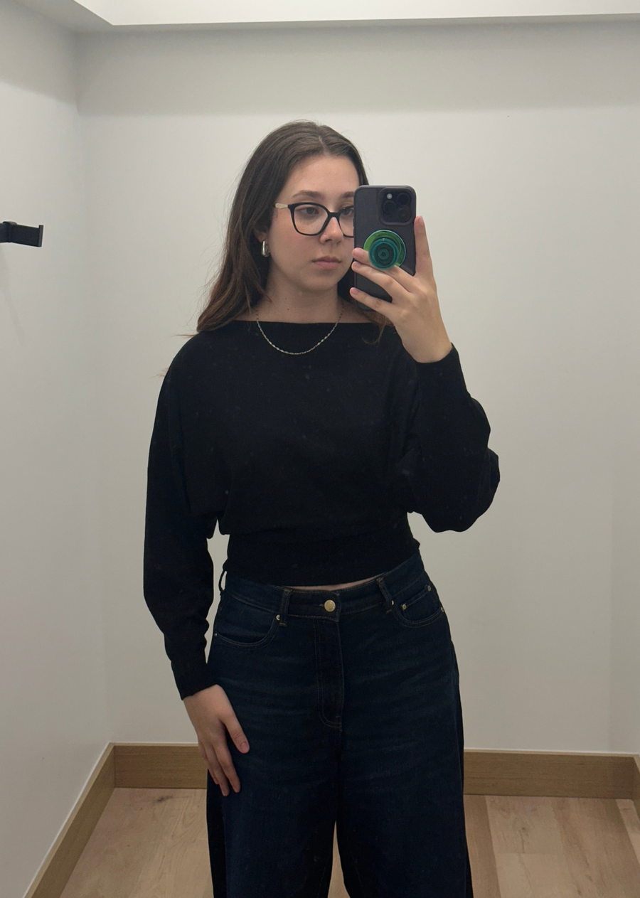 avalon cashmere blend dolman top in black, featuring a relaxed dolman silhouette, soft knit fabric, long sleeves, and a fitted waistband. 