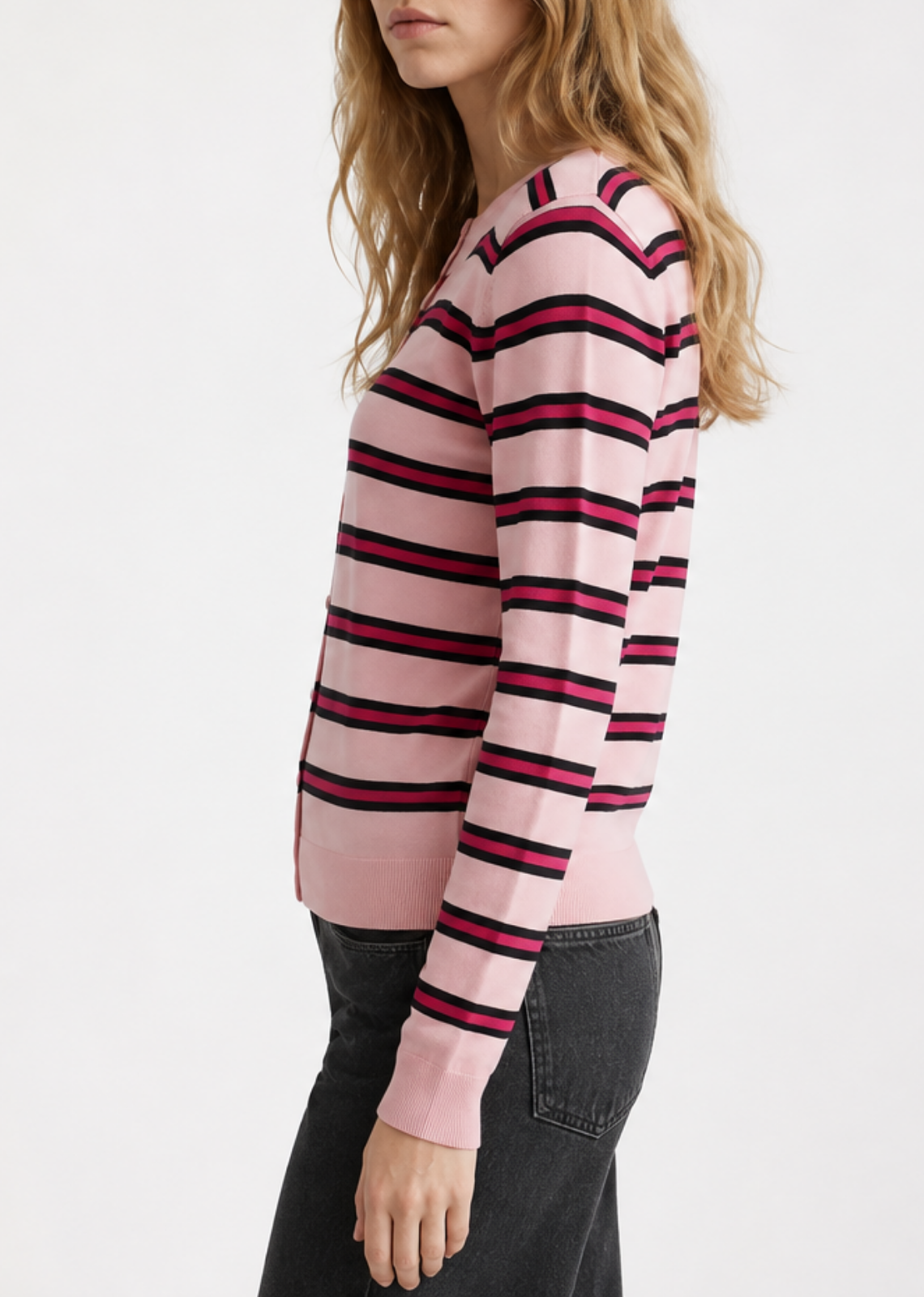 Pink and fuchsia rainbow striped cardigan with a crew neckline, button-front closure, and long sleeves.