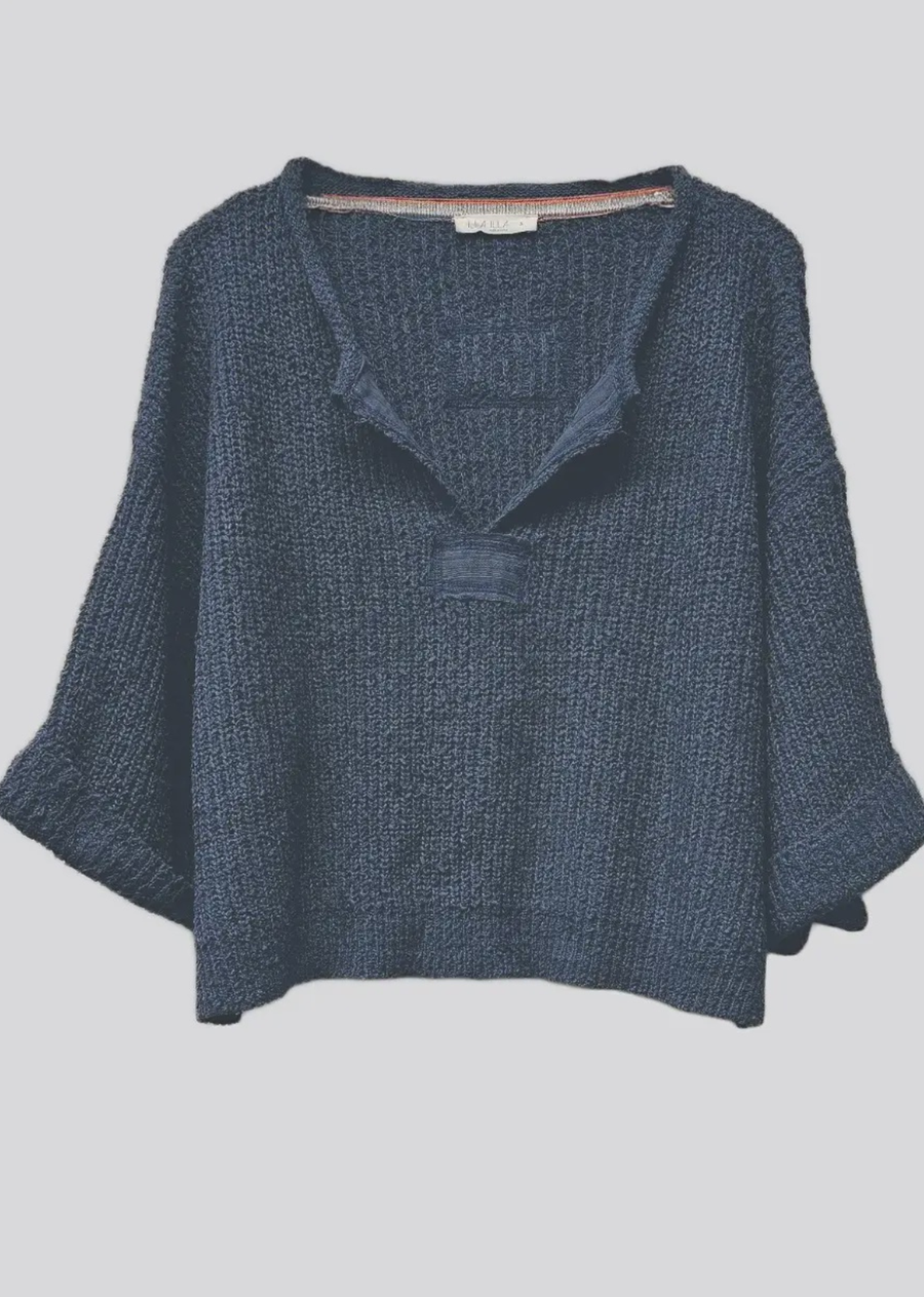 Our signature slouchy cropped sweater featuring v-neckline, 3/4 sleeves, and solid patch at front and back. Wearable all year round.