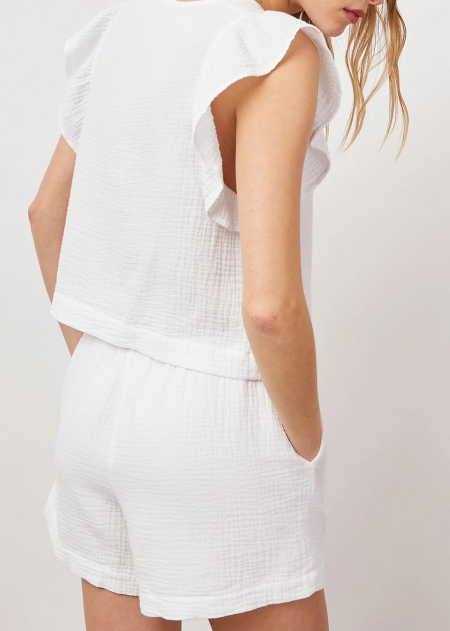 Rails Miley Top A soft cotton double gauze, short sleeve, white v-neck top featuring a straight fit, feminine cap sleeves with flutter detail, and slightly cropped length.