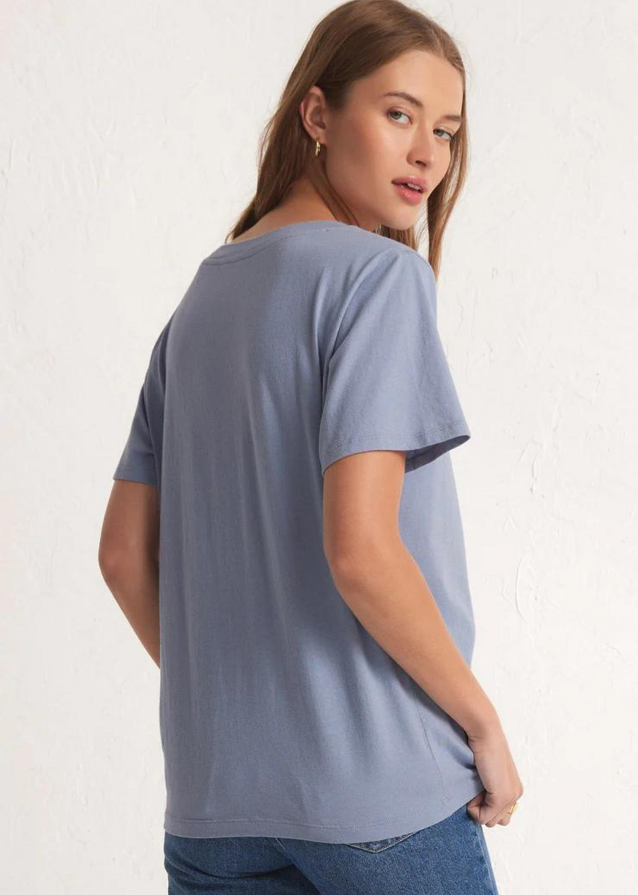 Z Supply Girlfriend V- Neck Tee- Stormy The Girlfriend V-Neck Tee will be love at first wear. Soft and comfortable, this relaxed tee looks just as good with denim as it does tucked into a pair of chic pants.