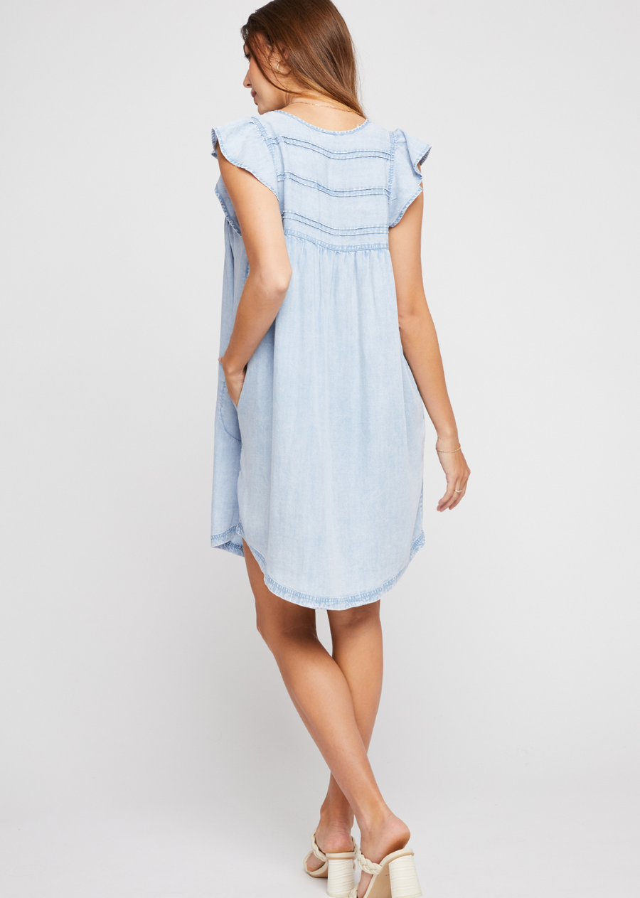 Gentle Fawn Olivia Dress.The Olivia dress is made of Tencel fabric that has been specially washed to achieve a dimensional look and soft feel. Features include side seam pockets, a curved hem shape, pintucks and stitch details throughout.