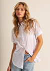 John & Jenn Shay Roll Sleeve Shirt- Chalk Introducing the Shay rolled-sleeve shirt from John + Jenn - a must-have for your wardrobe. This stylish shirt features a button front closure and short sleeves for a relaxed, effortless look. With its relaxed silhouette, you'll stay comfortable and cool all day long.