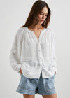 Rails Frances Top. The Frances top is cut from breathable luxe linen and complete with full-length relaxed sleeves. The top features flattering pleating details and buttons down the bodice, and pairs well with jeans, skirts, and more.