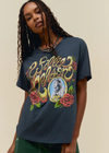 DayDreamer LA Willie Nelson Rose Frame Boyfriend Tee. Bound to be a major chart topper for the icon who dominates all conversations about country sound. A portrait of Willie Nelson lands in a rose frame graphic with his name accented in metallic ink.